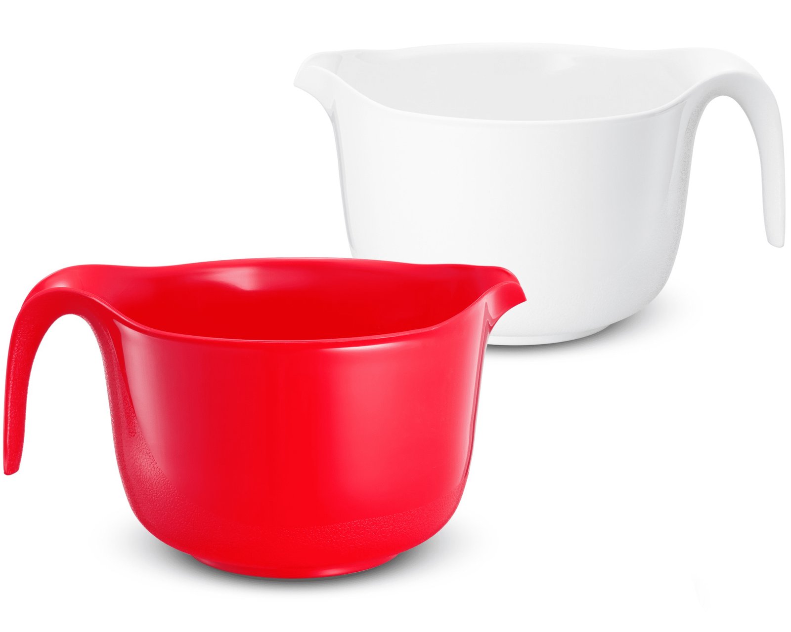 A ceramic batter bowl with a spout and handle sits on a wooden counter.