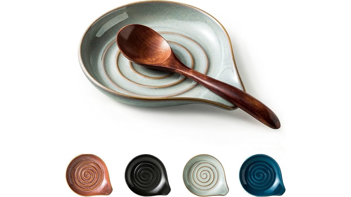 An elegant ceramic spoon rest sitting on a bright modern kitchen counter.