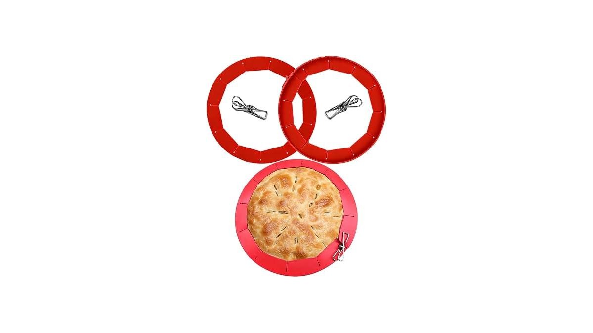 A heavy duty silicone pie crust shield protecting the edge of a baked pie.
