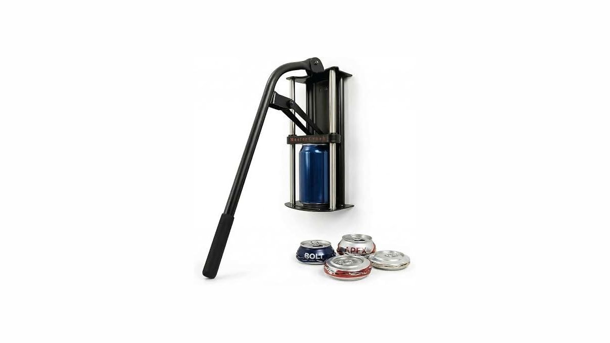 Heavy duty wall mounted can crusher crushing an aluminium can in a garage