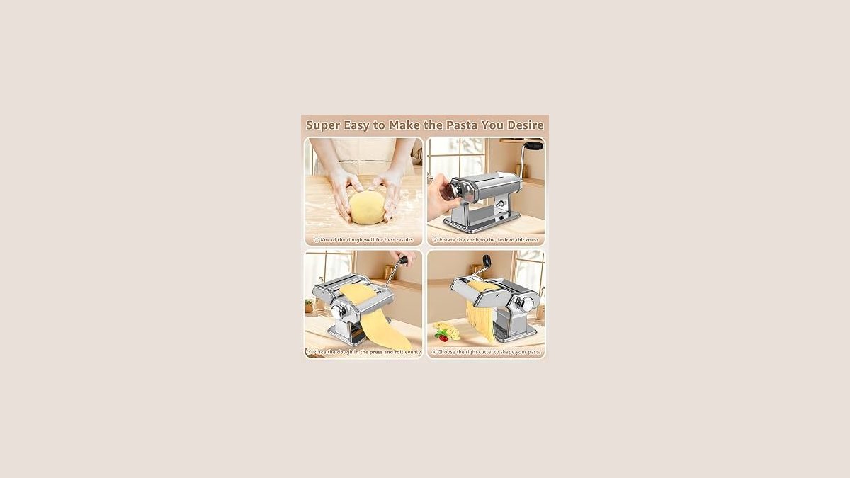 Manual stainless steel pasta maker on a wooden counter with fresh pasta dough