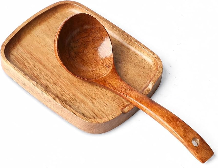 A practical silicone spoon rest keeps a kitchen stove top counter clean and organized.