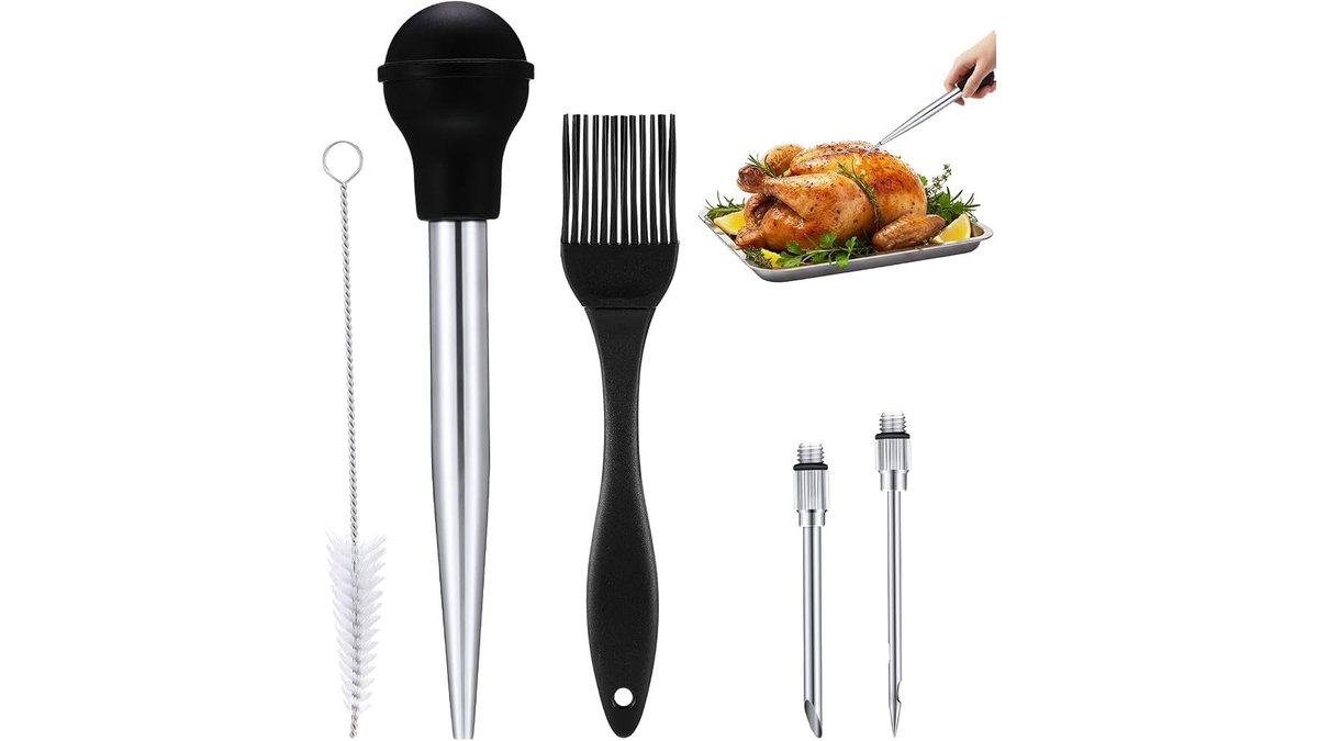 Stainless steel turkey baster set with cleaning brush on marble countertop