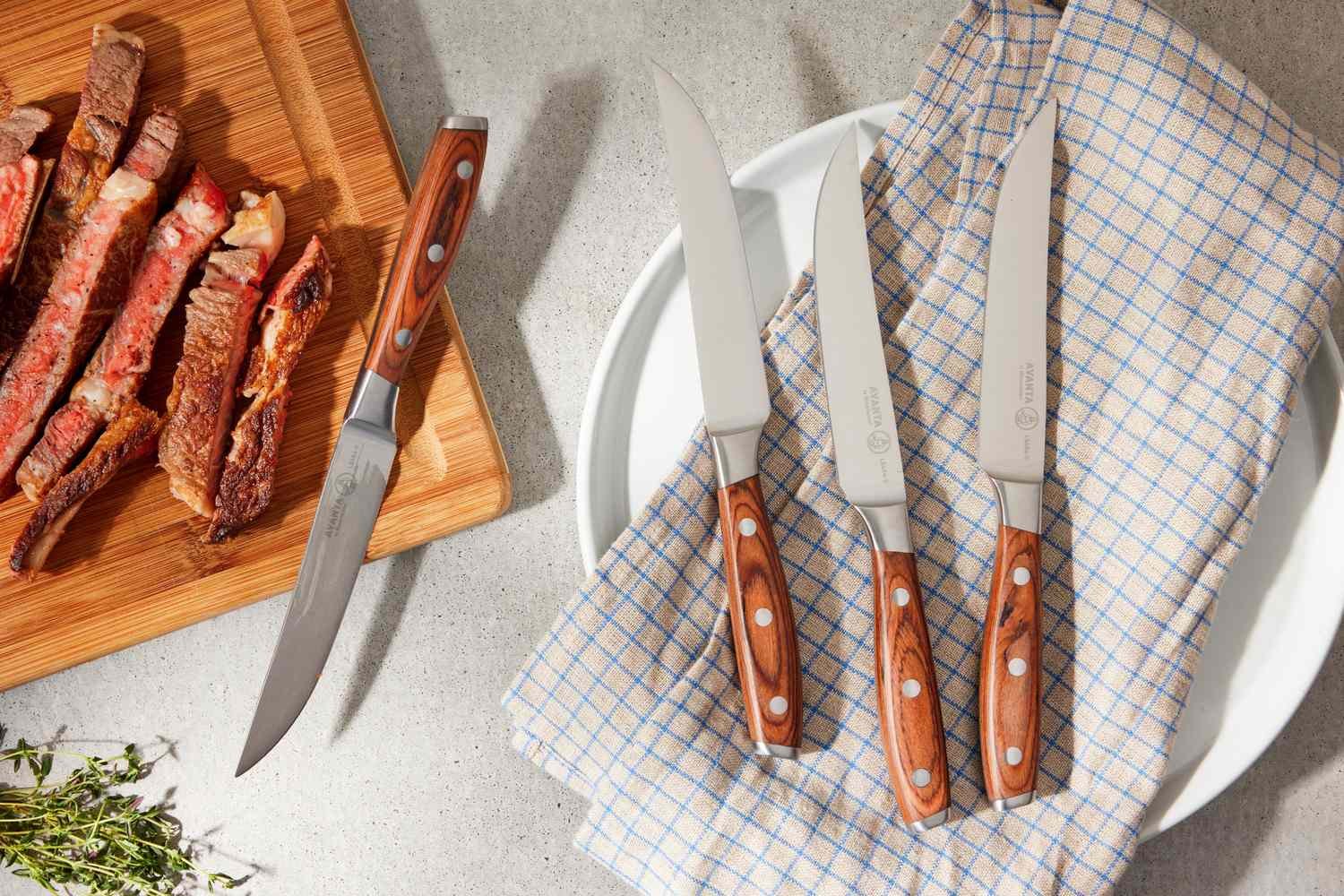 Wooden knife block set with stainless steel knives on a kitchen countertop